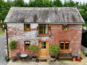 Luxurious private period cottage with oak beams, log fire, elegant interiors